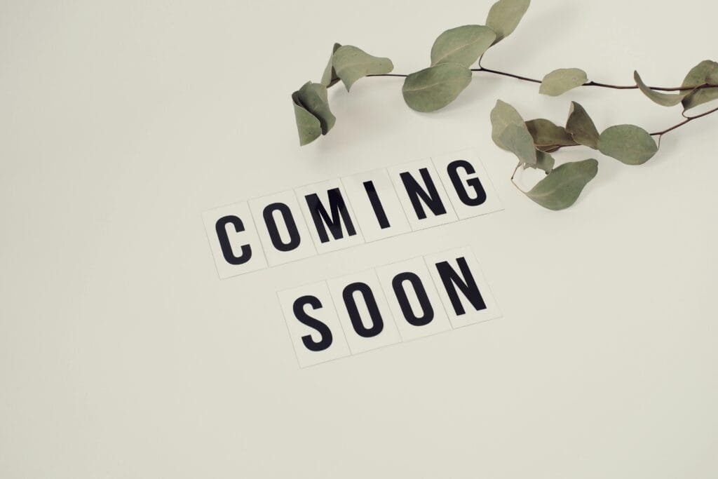 pexels-photo-4439444-4439444 Eucalyptus branch with 'Coming Soon' message on white background for announcements.
